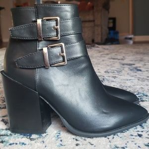 Black buckle ankle boots